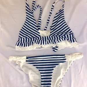 Striped bikini with lace detail from Everything But Water. Size S/M.